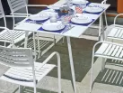 stalowy biały stół ogrodowy