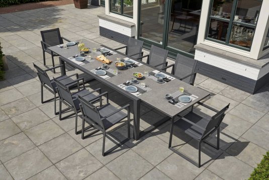ekskluzywny rozkłdany stół PRIMAVERA 220 do 340 cm blat ceramiczny nogi ciemnoszare krzesło Primavera Stack