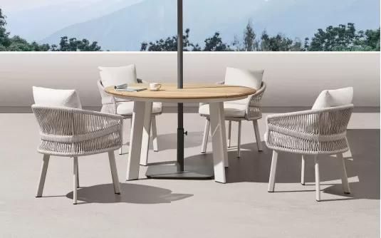 Beżowy okrągły luksusowy zestaw stół i 4 krzesła na taras AIO Higold