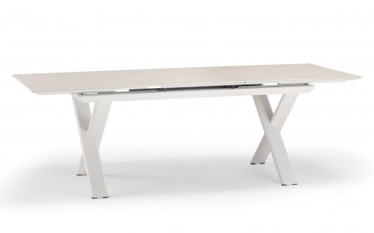 Aluminiowy stół ogrodowy SALINA beżowy nogami krzyżowe i rozkładany blat 200-260 cm kamienia spiekanego Salina