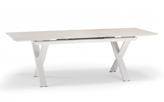 Aluminiowy stół ogrodowy SALINA beżowy nogami krzyżowe i rozkładany blat 200-260 cm kamienia spiekanego Salina