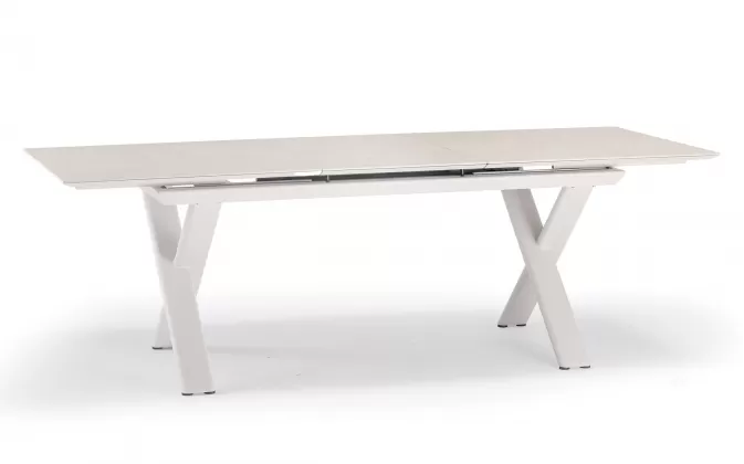 Aluminiowy stół ogrodowy SALINA beżowy nogami krzyżowe i rozkładany blat 200-260 cm kamienia spiekanego Salina
