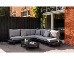 Wygodny narożnik na taras antracytowy z szarymi poduszkami salvador