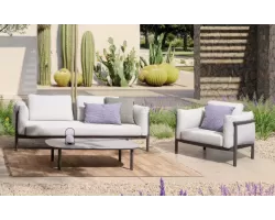 Nowoczesny bogato tapicerowany komplet wypoczynkowy na taras o grafitowy konstrukcji i szaro beżowych poduszkach olefin théodore bizzotto