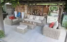 Komplet ogrodowy wypoczynkowy z technorattanu okrągłego z dużą sofą woma fotelami i stolikiem torres